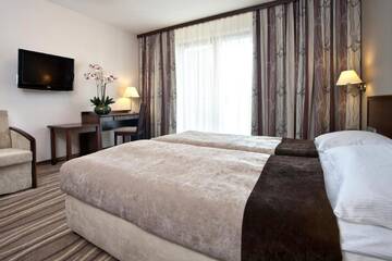 Фото номера Двухместный номер с 2 отдельными кроватями Отель Hotel SPA Budowlani г. Шавница 6